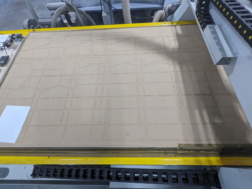 Image of the router's spoilboard before facing